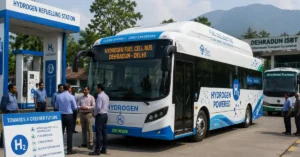 A hydrogen fuel cell bus displayed at a hydrogen refuelling station with Uttarakhand Transport Corporation officials inspecting the proposed clean public transport system.