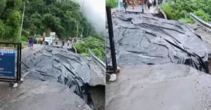 Screen grab from an ANI video showing the damaged section of the Dehradun-Mussoorie road after a landslide in Uttarakhand.