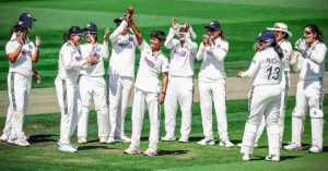 Indian women's cricket team celebrating after defeating England in the historic women's Test match at Lord's Cricket Ground.