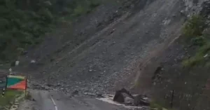 Fresh rockfall covering the national highway near Nagun on the Tehri–Uttarkashi border during heavy monsoon conditions.