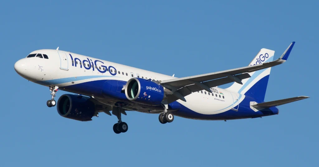 Passenger aircraft flying over mountainous terrain representing the new direct air service between Noida and Dehradun.