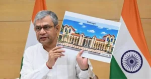 Railway Minister Ashwini Vaishnaw addresses the launch of the Ramnagar-Dehradun Express while displaying the proposed redevelopment design of Ramnagar Railway Station.