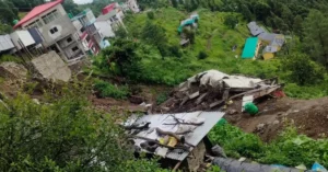 A landslide near NH-707A at Kaddookhal in Tehri Garhwal damaged a vacant building and caused slope failure beside nearby structures.