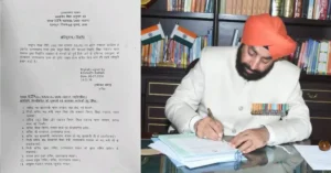 Governor Lt Gen Gurmeet Singh signing the approval for Uttarakhand's declaration as a fully literate state alongside the official notification.