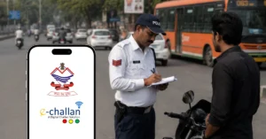 A traffic police officer issues an e-challan while the Uttarakhand Police app displaying the e-challan service is shown on a smartphone.