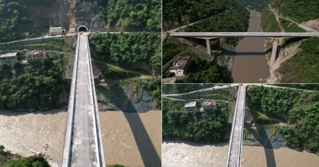 Aerial view of a bridge over a river in Rudraprayag connecting mountainous roads