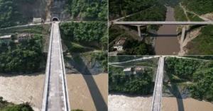 Aerial view of a bridge over a river in Rudraprayag connecting mountainous roads
