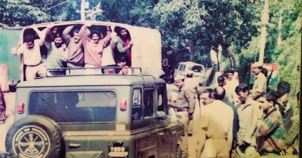 Protesters being taken away in a police vehicle during the Uttarakhand statehood movement in Mussoorie