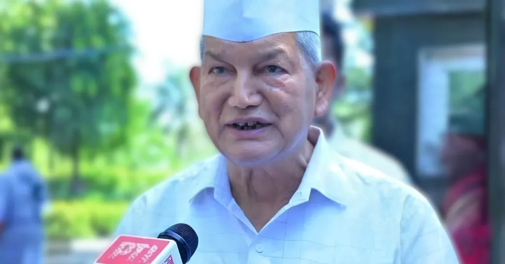 Senior Indian political leader speaking to media with a microphone