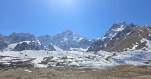 Representative view of आदि कैलाश high-altitude marathon runners on a mountain road in Pithoragarh.