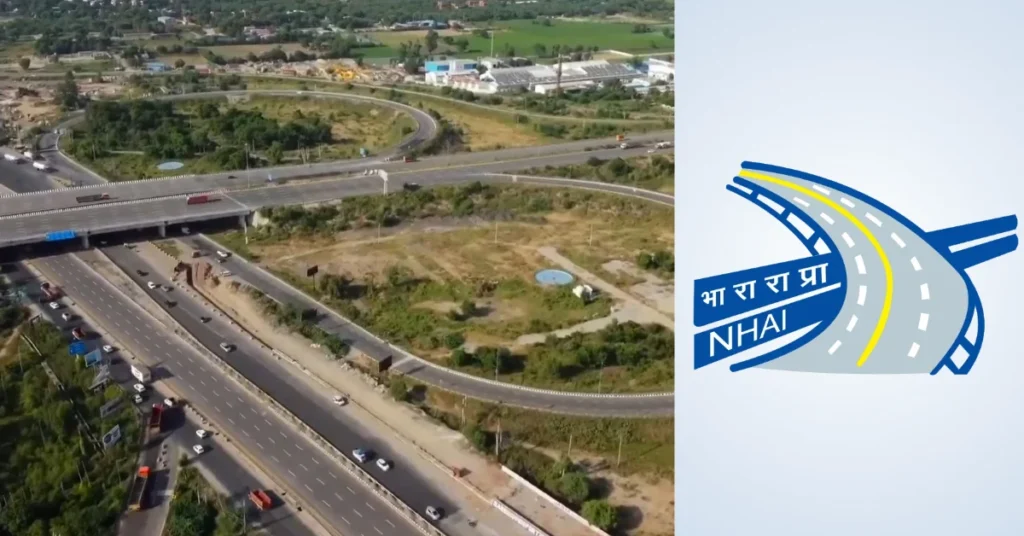 Aerial view of a multi-lane highway interchange associated with the Haridwar Spur of the Delhi-Dehradun Economic Corridor, alongside the NHAI logo.